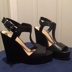 Vince Camuto black t-strap wedges.